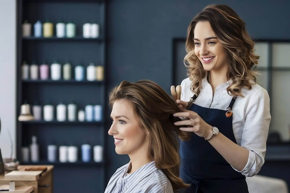 female-hairdresser-smiling-making-hairstyle-woman-beauty-salon