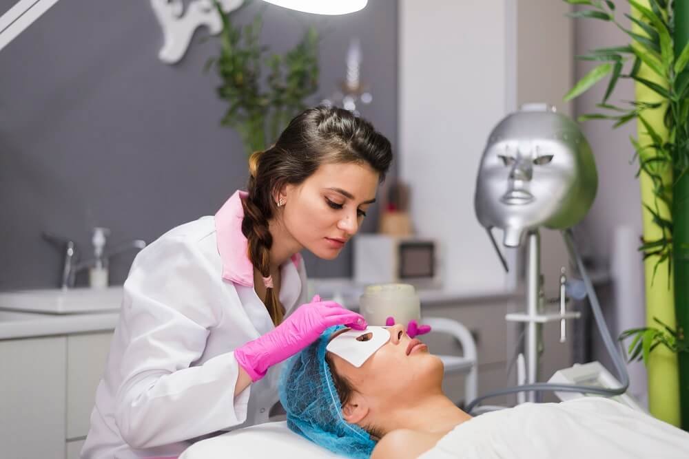 girl-receiving-facial-treatment-beauty-salon